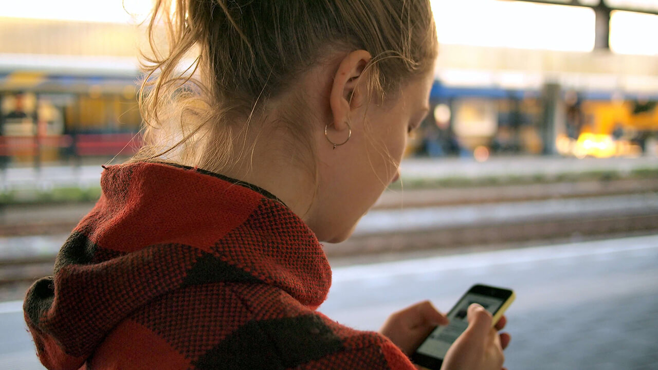 Person reading SMS messages